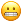 grimacing